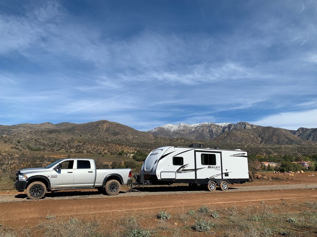 Towing camper in mountains
